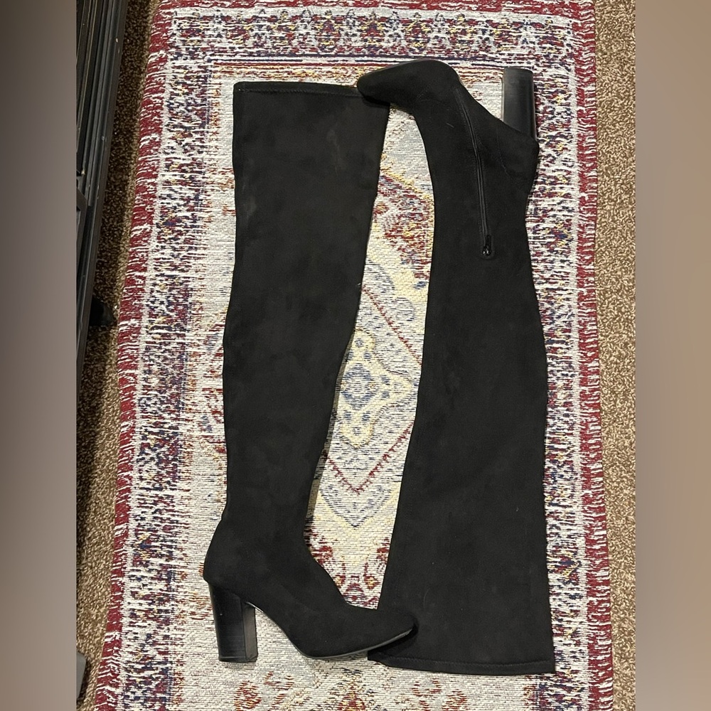 Black thigh high heel boot